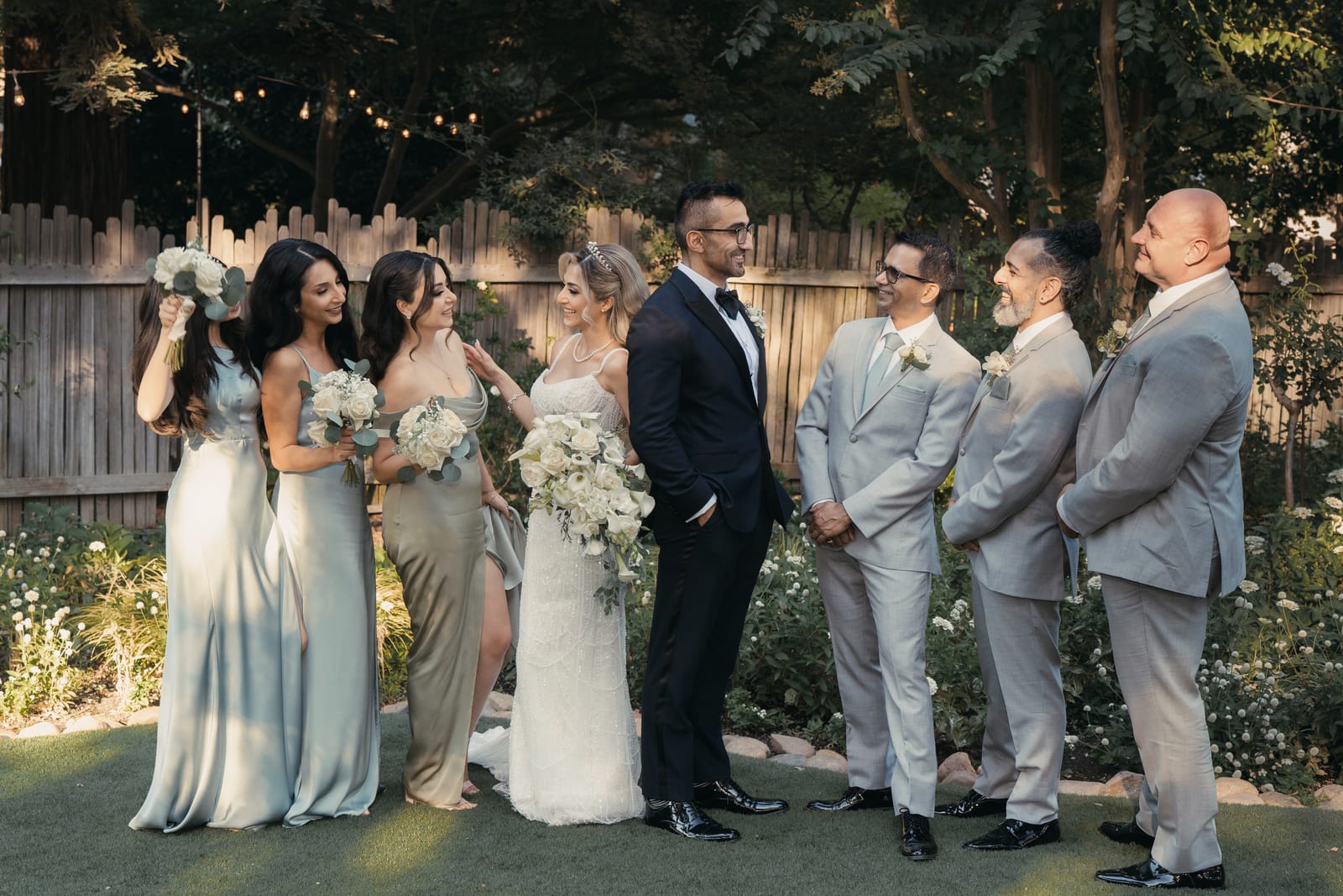 First dance beneath string lights